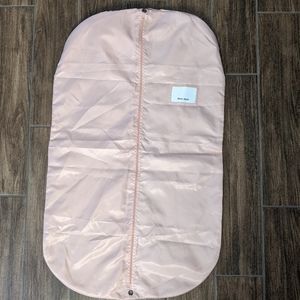 Pink Miu Miu garment bag